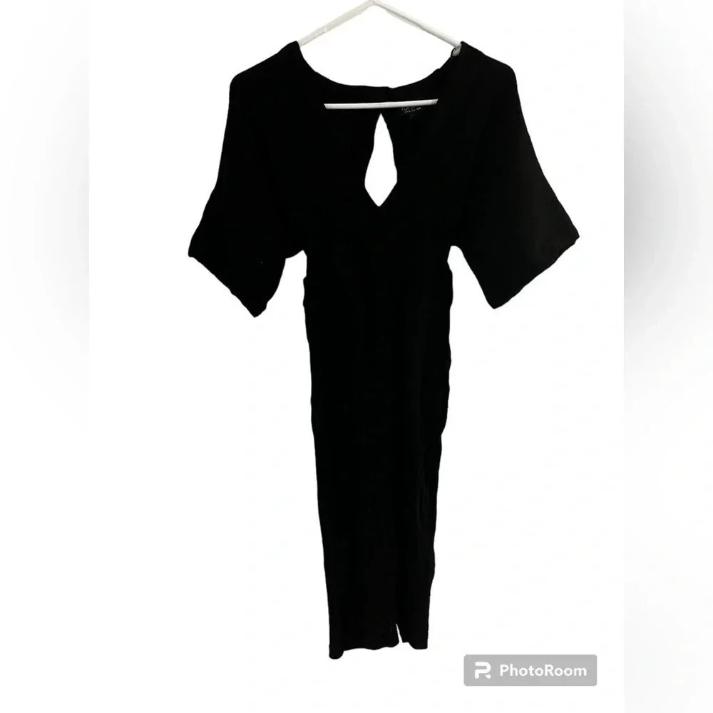 Top shop Black tight dress with low cut front and exposed back. Size 4